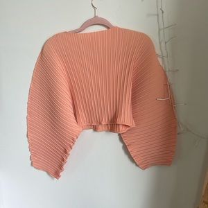 High necked cropped peach colored accordion blouse, long sleeve size XL